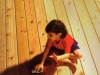 boy_on_cedar_decking boy_on_cedar_decking